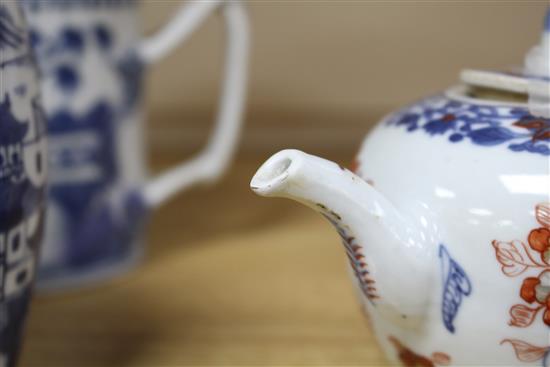 Three Chinese blue and white mugs, Qianlong period and a Chinese Imari teapot and cover, early 18th century tallest 15cm